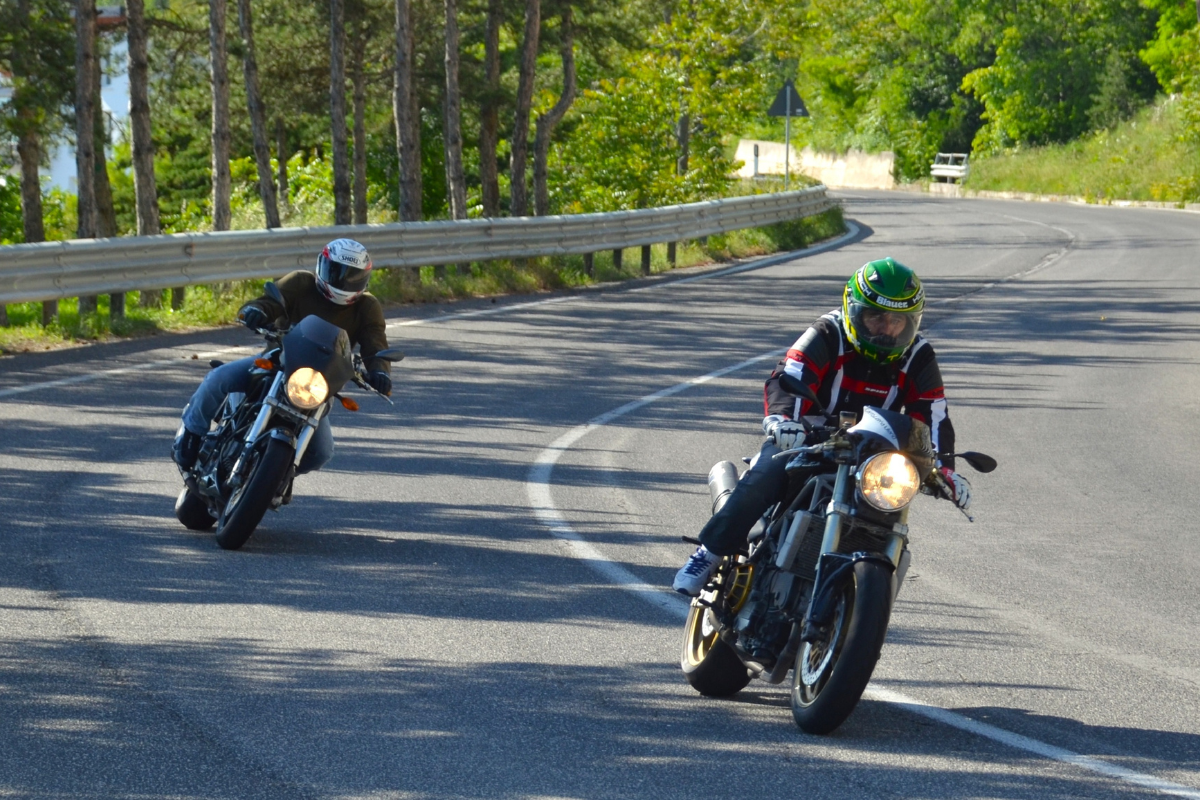 Two Spokane motorcyclists riding on a road in Washington state.